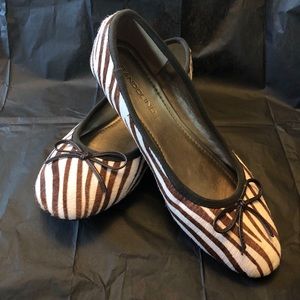 Bandolier brown & white zebra stripe ballet flats.